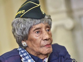 In this July 17, 2015 file photo, the country's oldest living veteran, 110-year-old Emma Didlake, meets with US President Barack Obama in the Oval Office of the White House in Washington, DC. Didlake, died August 16, 2015, just weeks after meeting President Barack Obama. She was 110. The African American housewife got sick early Sunday and died suddenly after complaining of feeling tired over several days, the San Antonio Express-News reported, citing her granddaughter Marilyn Horne. Didlake met with Obama on July 17. She has received various decorations for her service during World War II. Didlake had joined the Women's Army Auxiliary Corps in 1943, defying racism and segregation at a time when most women stayed home. AFP PHOTO/MANDEL NGAN