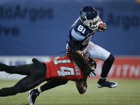 RedBlacks’ Abdul Kanneh tried to make a tackle on Toronto Argonauts’ Jason Barnes when the two teams met last season.