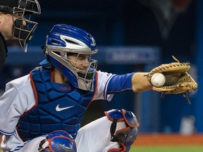 Josh Thole is expected to rejoin the Blue Jays on Sunday. (Craig Robertson/Toronto Sun)