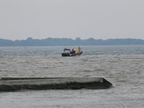 A Toronto Police Marine Unit search in the Toronto harbour near the mouth of the Humber River Sunday June 14, 2015. Stan Behal/Tostmedia Network FILE PHOTO