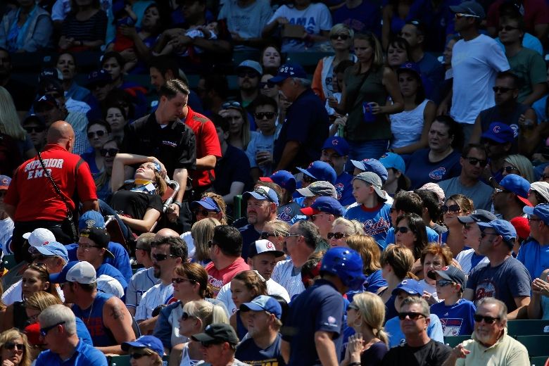 Female hit by a foul ball during Cubs game at Wrigley Field