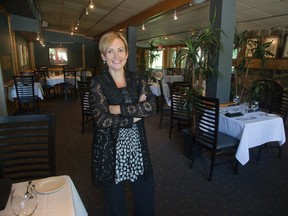 Joelle Lees is the new owner of Michael?s on the Thames. She has brought in some modern technology but says the things that made the restaurant famous will remain. (DEREK RUTTAN, The London Free Press)