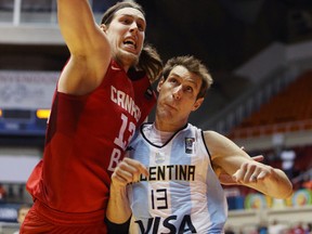 Kelly Olynyk of Team Canada goes up for a shot against Argentina during their first game of the Tuto Marchand Cup in San Juan. Canada rallied to beat the Argentines 85-80 at the Roberto Clemente Coliseum. (JOSE JIMENEZ TIRADO/FIBAAMERICAS.com)