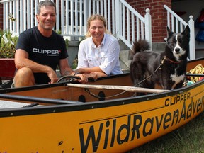 Adventurers Pierre Pepin and Jennifer Gosselin with dog Jasmine in Kingston on Aug. 22. The team has traveled all over North America for the past 14 months. Steph Crosier/The Whig-Standard