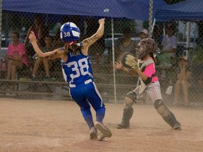 Kieran Raymo gets ready to hit the dirt as she scores during the Kingston Kobras game against Cambridge.  The Kobras would take the game 7-0 and go undefeated to win the provincial championships in Windsor. (Supplied photo)