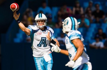 Toronto Argonauts quaterback Trevor Harris throws the ball against the Ottawa RedBlacks during the first half of CFL football action in Toronto, Sunday August 23, 2015. THE CANADIAN PRESS/Mark Blinch