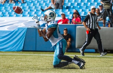 Toronto Argonauts Tori Gurley catches a touchdown against the Ottawa RedBlacks during the first half of CFL football action in Toronto, Sunday August 23, 2015. THE CANADIAN PRESS/Mark Blinch