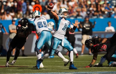 Toronto Argonauts' quarterback Trevor Harris throws the ball against the Ottawa RedBlacks during the first half of CFL football action in Toronto on Sunday, August 23, 2015. THE CANADIAN PRESS/Mark Blinch