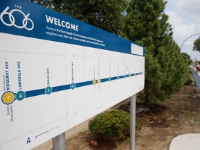 In this Tuesday, Aug. 18, 2015 photo, a map for the Bloomingdale Trail is seen along its path in Chicago. The trail was once an abandoned Chicago railway line that has been transformed into a bike corridor. (AP Photo/Christian K. Lee)