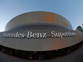 This is a Feb. 1, 2013, file photo showing the Mercedes-Benz Superdome in New Orleans. The Atlanta Falcons will share a stadium name with their biggest rival.  Mercedes-Benz, which already has its name on the New Orleans Superdome, was announced as the title sponsor of Atlanta's $1.4 billion stadium on Monday, Aug. 24, 2015. (AP Photo/Gene J. Puskar, File)