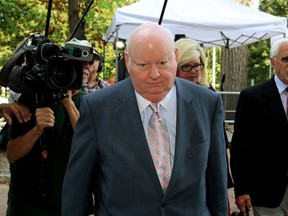 Former Conservative Senator Mike Duffy arrives at the courthouse in Ottawa on Monday, August 24, 2015. THE CANADIAN PRESS/Fred Chartrand