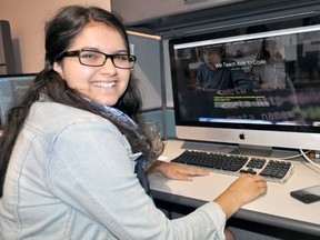 Madelaine Coelho, 18, at Arcane in London Ont. Aug. 20, 2015. Coelho is behind an upcoming coding camp for Londoners 12-16 years old. CHRIS MONTANINI\LONDONER\POSTMEDIA NETWORK