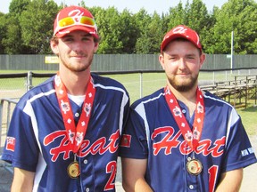 Evan Lindsay (left) and Dan Skinner won gold medals with the New Hamburg Heat, U18 national softball champions, last week in New Brunswick. SUBMITTED