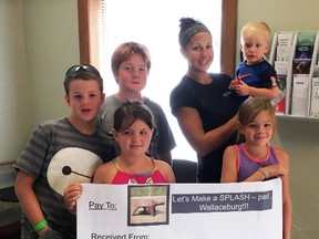Submitted photo: Physiotherapy and Sports Injury Clinic owner Staci Modde kicked off fundraising efforts for the Wallaceburg Splash Pad by donating $500 last week. Pictured making the donation are back row, Braeden and Rory Young, Staci Modde, Ryan Vitek. Front row Raleigh and Ainsley Young holding the cheque.