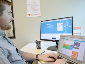 Michael Haley, The Rounds/The Clerks' community relations co-ordinator, works on the staging/demo site. (Postmedia Network)