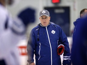 Interim coach Steve Spott watches a Toronto Maple Leafs' practice at the Mastercard Centre in Toronto on January 6, 2015. (Craig Robertson/Toronto Sun/QMI Agency)