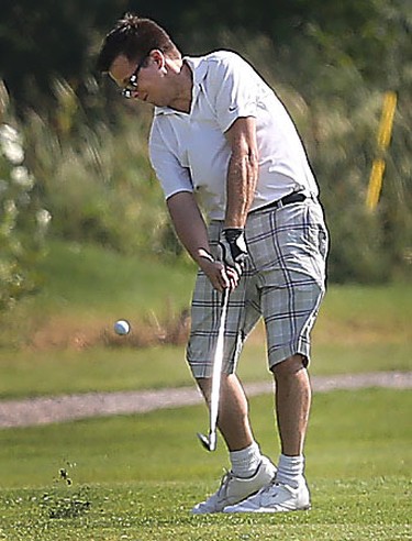 Jeremy Kirk takes a second shot  during the Ottawa Sun Scramble City Championship at Manderley On The Green in Ottawa Monday Aug 24, 2015. Monday's golfers took part in the D division draw. Tony Caldwell/Ottawa Sun/Postmedia Network