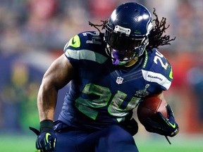 Seahawks running back Marshawn Lynch is projected by many as the No. 1 back in fantasy for the upcoming season but there are some concerns about his commitment to the team. (AFP/PHOTO
