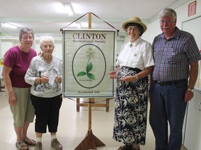 The Clinton Horticultural Society held its annual flower show last Friday. A judge from Hanover came to evaluate the entries and choose winners in six categories. Winners were, from left, Audrey Lyndon, Eleanor Falconer, Jeannette Martin and Michael Falconer. (Laura Broadley Clinton News Record)