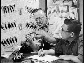 Father and son, Frank and Bill Edgar discussing lure design in 1951. With permission of Lucky Strike Bait Works Limited, Peterborough, Ontario.