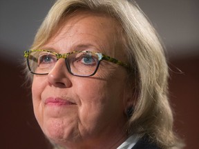 Green Party Leader Elizabeth May pauses while making a campaign announcement about affordable housing in Burnaby, B.C., on Tuesday August 25, 2015. A federal election will be held October 19. THE CANADIAN PRESS/Darryl Dyck