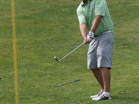 Alain Vaillancourt putts onto the 18th green during Sun Scramble play at Dragonfly Golf Links in Renfrew (Ontario), Tuesday, August 25, 2015. Ottawa Sun Scramble. Absolute Comedy C Division. Dragonfly Golf Links. MIKE CARROCCETTO / OTTAWA SUN / POSTMEDIA NETWORK