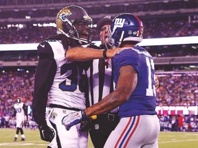 Jacksonville Jaguars safety Sergio Brown gets in the face of Giants receiver Odell Beckham during their game on Saturday. (AFP)