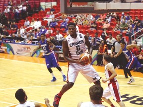 Canada’s Melvin Ejim grabs a rebound during yesterday’s game against the Dominican Republic at the Tuto Marchand Cup. (Jose Jimenez Tirado/FIBA Americas)