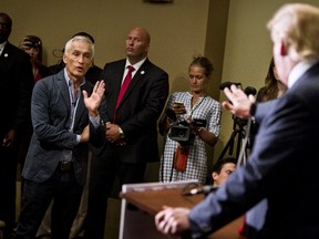 Republican presidential candidate Donald Trump spars with Univision reporter Jorge Ramos before his "Make America Great Again Rally" at the Grand River Center in Dubuque, Iowa, on Aug. 25, 2015. Ramos was removed from Trump's news conference on Tuesday after the Republican presidential candidate said the journalist was asking a question out of turn. (REUTERS/Ben Brewer)