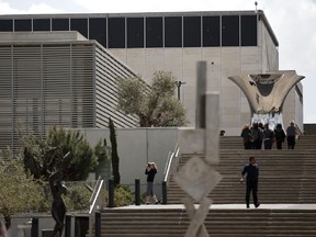 Visitors take pictures on the main venue of the Israel Museum on March 30, 2015 in Jerusalem. (AFP PHOTO/THOMAS COEX)