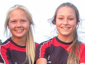 Emilie Merilainen and Tia Svoboda of the U18 girls Belleville Junior Bulldogs rugby team. (Intelligencer file photo)