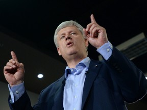 Conservative leader Stephen Harper makes a campaign stop in Montreal on Tuesday, August 25, 2015. (The Canadian Press)