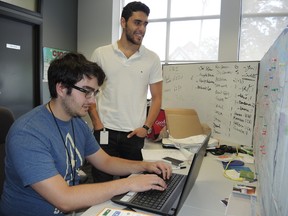 Mathieu Jobin, left, and Cyril Moukarzel's company, eCelery, is one of the seven participating businesses in this year's Startup Garage, an event that shows off young entrepreneurs and their startup businesses. eCelery connects local cooks specializing in various ethnic foods with those who want the food delivered to their doorsteps. Moukarzel and Jobin are hoping to launch a mobile app in the next few months. Julienne Bay/Ottawa Sun