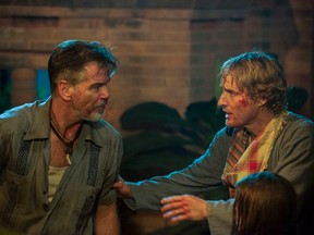 Pierce Brosnan and Owen Wilson in No Escape. (Handout)