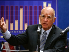 California Gov. Jerry Brown talks about the drought and water restrictions following a meeting with San Diego County officials to discuss continued conservation efforts Tuesday, Aug. 11, 2015, in San Diego. (AP Photo/Lenny Ignelzi)