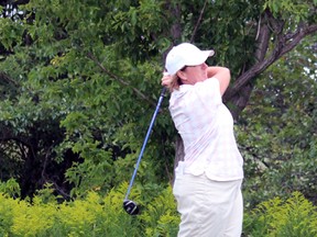 Judith Kyrinis hits a tee shot during the opening round of the Canadian Women's Mid-Amateur and Senior Championship at Sawmill Creek Golf Resort and Spa. The 51-year-old Thornhill resident shot a three-under 68 for a tie for first place. (Terry Bridge/Sarnia Observer/Postmedia Network)