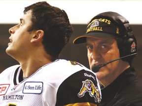Kent Austin (right) points out that all his Ticats have done the past two years is lose two Grey Cups. QB Zach Collaros (left) us one who is buying into that philosophy. (Reuters)