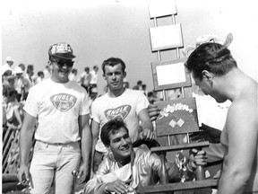 Dan Rini driving and older brother Jim Rini on the right.