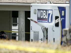 The WDBJ7 live truck is seen outside of the Bridgewater Plaza in Moneta, Virginia, August 26, 2015. The suspect in the on-air shooting of two Virginia television journalists was pronounced dead at a hospital on Wednesday (August 26), police said. The suspect Vester Flanagan, 41, shot himself after a police pursuit following the shooting of the journalists from CBS affiliate WDBJ7 in Roanoke, Virginia. Police pursued the suspect and in the late morning, local media and CNN reported the suspected shooter had shot himself. He was transported from the scene by ambulance but was later pronounced dead at hospital. REUTERS/Chris Keane