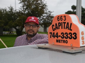 Hayder Zeyu, a Capital Taxi driver of 13 years, told the Sun Thursday the situation for drivers is not good. He said a majorissue between drivers and their employers is that it's too early to negotiate a three year deal if amendments have yet to have been made to the city's taxi  bylaw. (SAM COOLEY/ OTTAWA SUN)