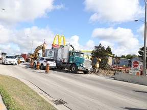 JASON MILLER/THE INTELLIGENCER
Crews work on making way for a feeder main on North Front Street, just north of College Street.