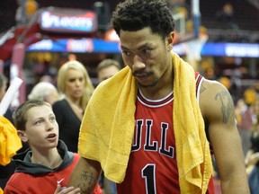 Chicago Bulls guard Derrick Rose (1) walks off the court after a 99-92 win over the Cleveland Cavaliers in game one of the second round of the NBA Playoffs at Quicken Loans Arena. Mandatory Credit: David Richard-USA TODAY Sports