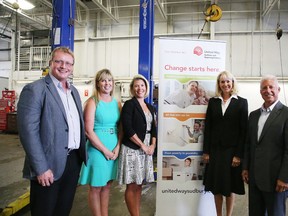 Cambrian Ford took an early start to their United Way Campaign with an employee barbecue and games, on Wednesday. On hand for the event are Scott McCulloch, president of Cambrian Ford, Lisa Bonin, campaign chair of the 2015 United Way Centraide, Michelle Caza Joly, vice president of Cambrian Ford, and Ford Canada CEO Dianne Craig and Mike Herniak, general manager of the Eastern market for Ford of Canada. Gino Donato/Sudbury Star/Postmedia Network