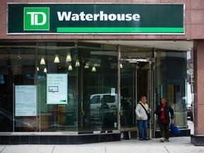 Customers leave a TD Waterhouse investment centre in Calgary, April 3, 2014. (REUTERS/Todd Korol)