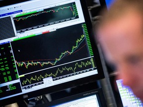 A trader works on the floor of the New York Stock Exchange during the morning of Aug. 27, 2015. (Andrew Burton/Getty Images/AFP)