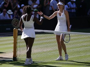 Serena Williams (left) shakes hands at the net with Maria Sharapova after defeating her in their women's singles semifinal match at Wimbledon in London on July 9, 2015. Williams could face Sharapova as she tries to complete the Grand Slam. (AP Photo/Pavel Golovkin)