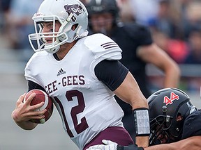 Belleville's Derek Wendel of the Ottawa Gee-Gees runs the football against crosstown rival Carleton Ravens in last year's Panda Bowl at TD Place. (Richard A. Whittaker photo)