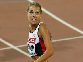 Canada's Melissa Bishop looks at the scoreboard after the women's 800 metres semifinal during the IAAF World Championships at the National Stadium in Beijing on Thursday, Aug. 27, 2015. (Fabrizio Bensch/Reuters)