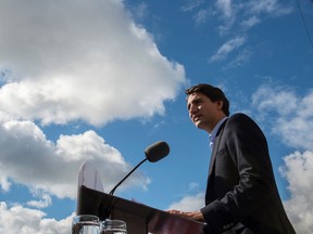 Liberal leader Justin Trudeau pledged Thursday that if he becomes prime minister he guarantees the federal government will run at least three years of deficits.