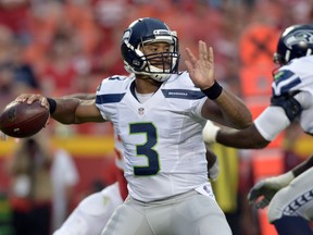 Seahawks quarterback Russell Wilson throws the ball during the first half preseason NFL action against the Chiefs at Arrowhead Stadium in Kansas City, Mo., on Aug. 21, 2015. (Denny Medley/USA TODAY Sports)